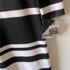 🔥 Date Night is back! Black & White bodycon dress! NWT size: Large